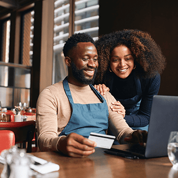 Business owners using online banking.