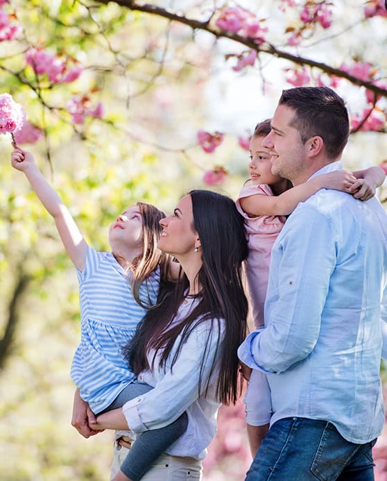 Family enjoying spring flowers.